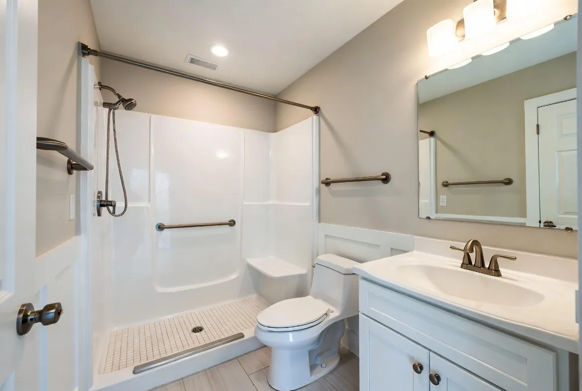Accessible bathroom conversion with grab bars and roll-in shower in Upstate South Carolina