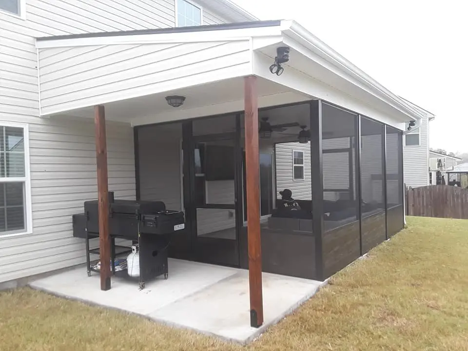 Covered patio construction with ceiling fan and outdoor living space in Upstate South Carolina