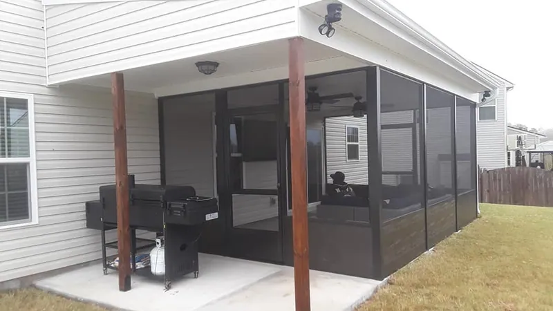 Aluminum screened porch installation in Simpsonville SC with covered patio and outdoor living space by Burch Contracting Aluminum screened porch installation in Simpsonville SC with covered patio and outdoor living space by Burch Contracting